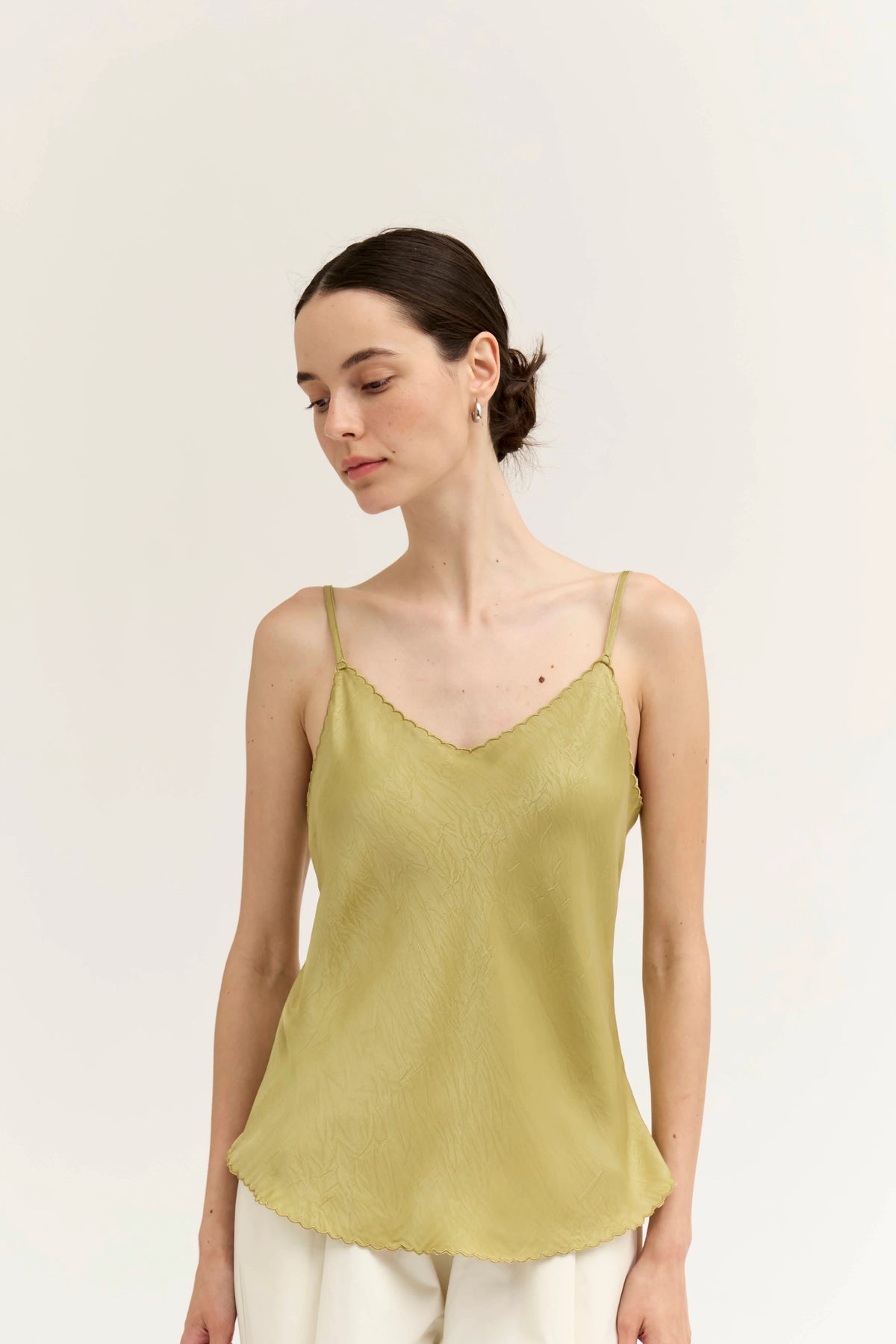 Scallop edge bias tank